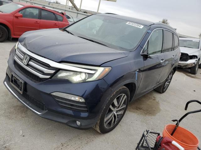HONDA PILOT ELIT 2016 with VIN 5FNYF6H02GB086514 - Photo from auction