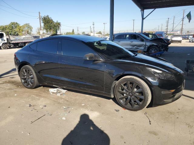 Photo 4 from auction – 2022 TESLA MODEL 3 with VIN 5YJ3E1EB9NF179422
