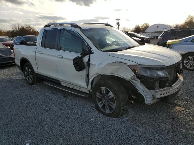 Photo 4 from auction – 2017 HONDA RIDGELINE with VIN 5FPYK3F62HB008793