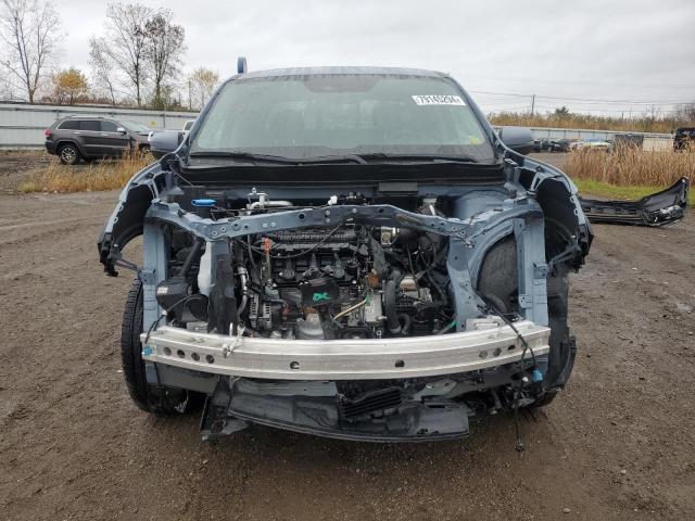 Photo 5 from auction – 2023 HONDA RIDGELINE with VIN 5FPYK3F59PB065336