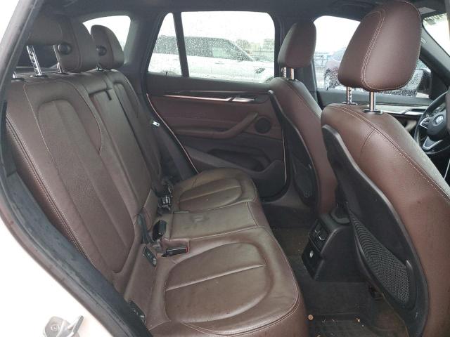 Photo 11 from auction – 2017 BMW X1 XDRIVE2 with VIN WBXHT3C37H5F68011