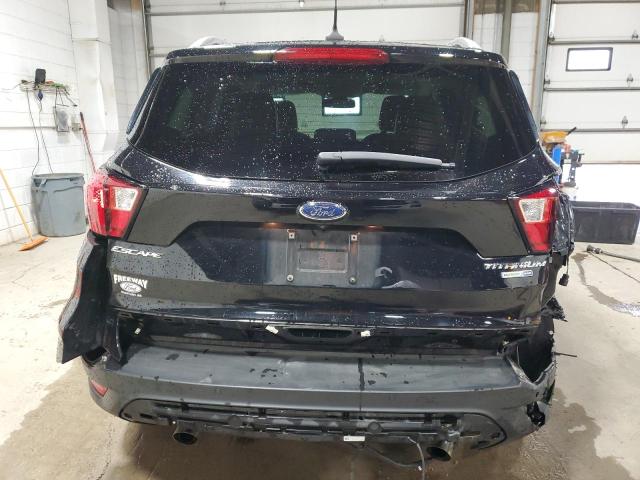 Photo 6 from auction – 2019 FORD ESCAPE TIT with VIN 1FMCU9J98KUC27012