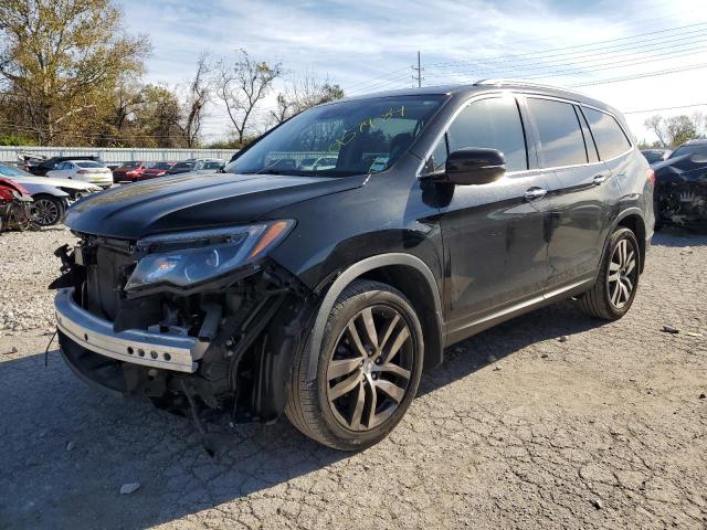HONDA PILOT TOUR 2018 with VIN 5FNYF6H98JB020877 - Photo from auction
