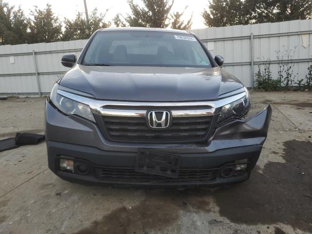 Photo 5 from auction – 2017 HONDA RIDGELINE with VIN 5FPYK3F28HB020489