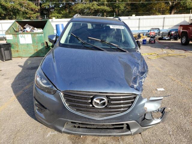 Photo 5 from auction – 2016 MAZDA CX-5 GT with VIN JM3KE2DY5G0676046