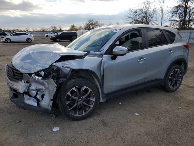 MAZDA CX-5 GT 2016 with VIN JM3KE4DYXG0606294 - Photo from auction