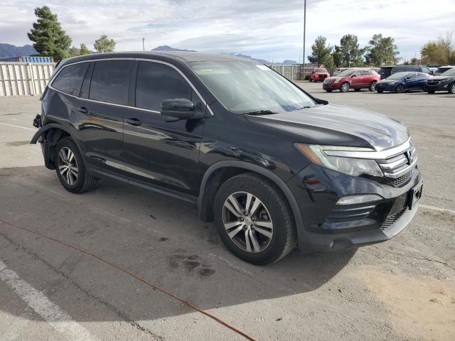 Photo 4 from auction – 2018 HONDA PILOT EXL with VIN 5FNYF5H54JB015201