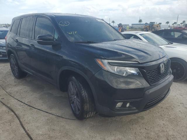 Photo 4 from auction – 2021 HONDA PASSPORT E with VIN 5FNYF7H57MB003902