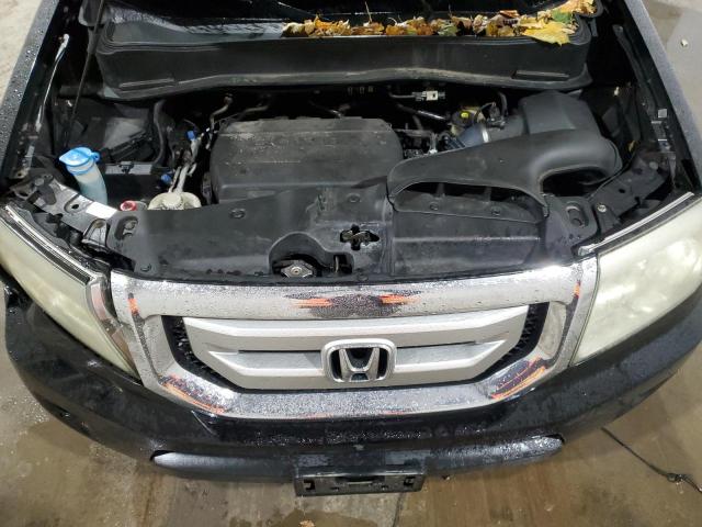 Фото 12 с аукциона – 2011 HONDA PILOT TOUR с VIN 5FNYF4H91BB003229