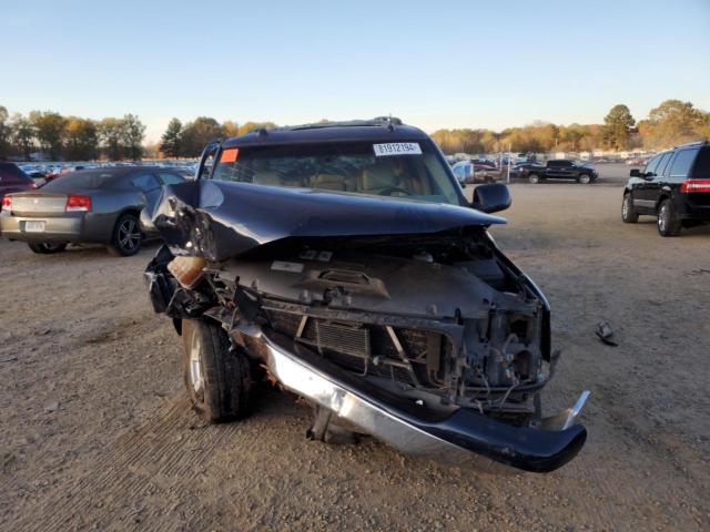 Photo 5 from auction – 2004 GMC YUKON with VIN 1GKEC13Z74R193878