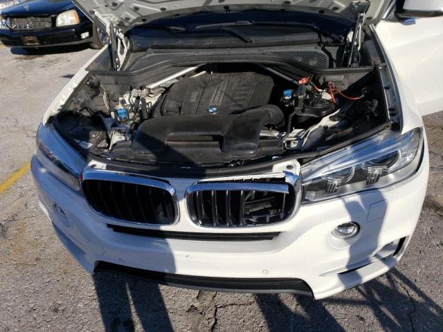 Photo 12 from auction – 2014 BMW X5 XDRIVE3 with VIN 5UXKS4C59E0J94468