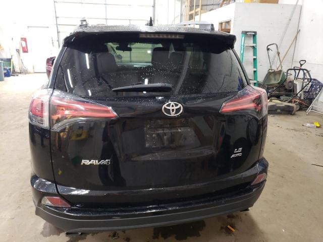 Photo 6 from auction – 2018 TOYOTA RAV4 LE with VIN 2T3BFREV2JW727783