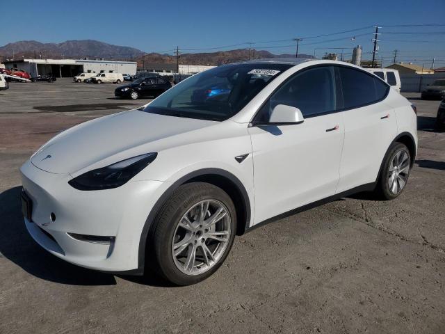 TESLA MODEL Y 2023 with VIN 7SAYGDED6PF970077 - Photo from auction