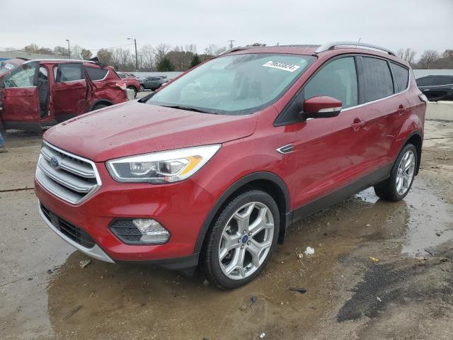 FORD ESCAPE TIT 2017 with VIN 1FMCU9J96HUE84582 - Photo from auction