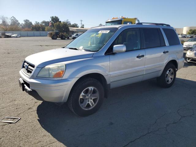HONDA PILOT EX 2003 with VIN 2HKYF18473H594303 - Photo from auction