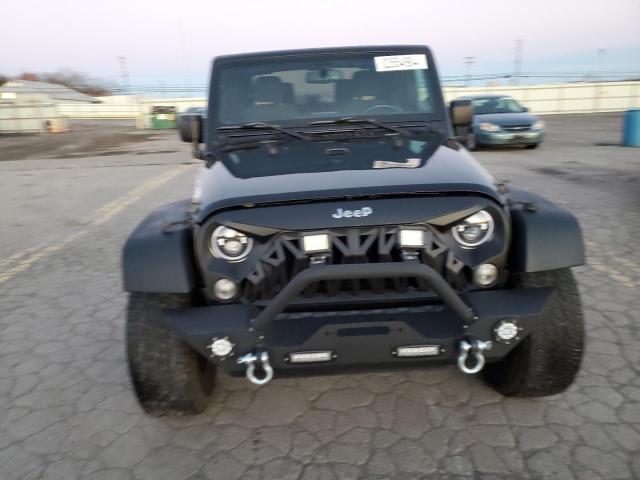 Photo 5 from auction – 2015 JEEP WRANGLER S with VIN 1C4AJWAGXFL555805
