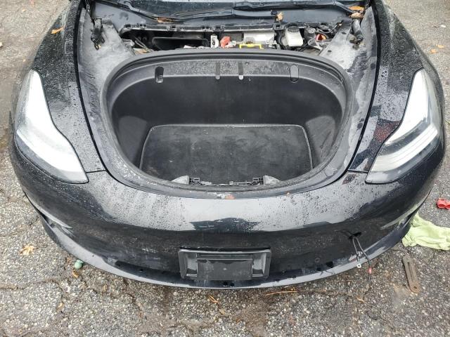 Photo 11 from auction – 2018 TESLA MODEL 3 with VIN 5YJ3E1EA5JF004960