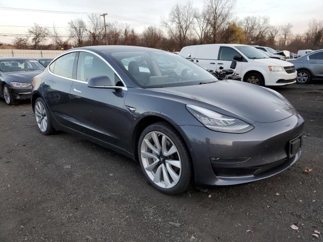 Photo 4 from auction – 2018 TESLA MODEL 3 with VIN 5YJ3E1EA3JF033261