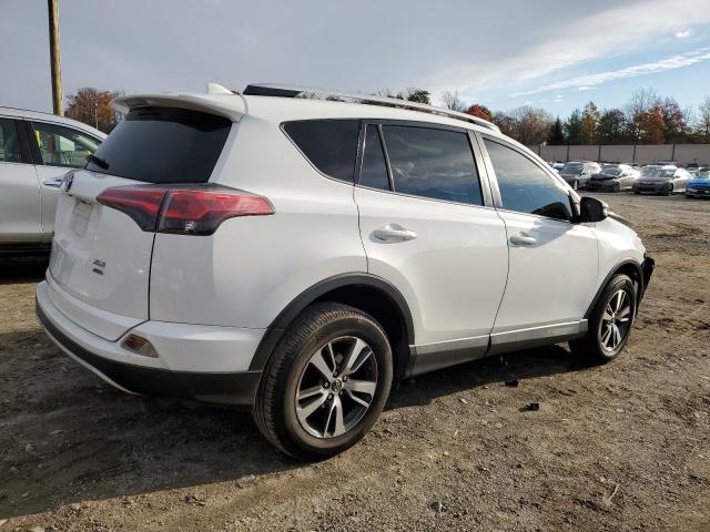 Photo 3 from auction – 2016 TOYOTA RAV4 XLE with VIN JTMRFREV0GJ067751