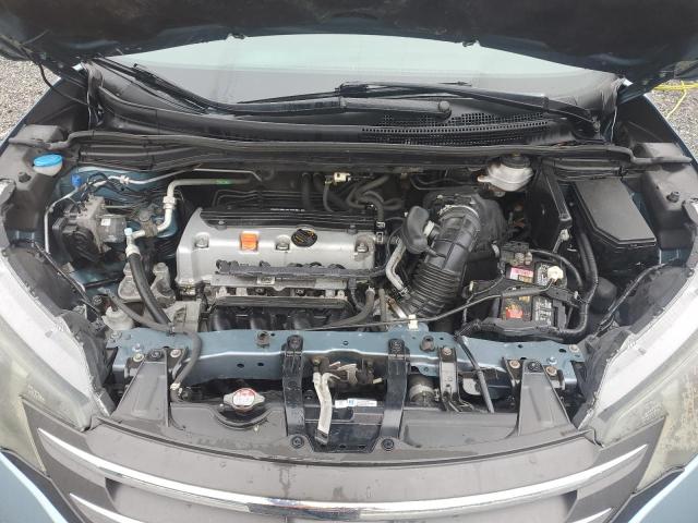 Photo 11 from auction – 2014 HONDA CR-V LX with VIN 2HKRM4H32EH660388