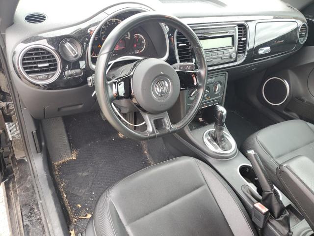 Photo 8 from auction – 2013 VOLKSWAGEN BEETLE with VIN 3VWJX7AT1DM657830