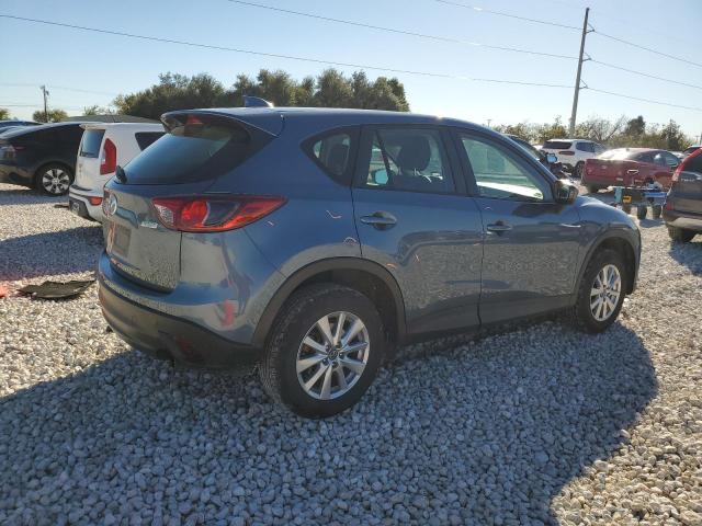 Photo 3 from auction – 2014 MAZDA CX-5 SPORT with VIN JM3KE2BEXE0426887