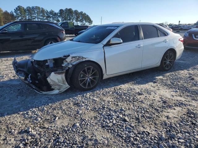 TOYOTA CAMRY LE 2017 with VIN 4T1BF1FK9HU686996 - Photo from auction