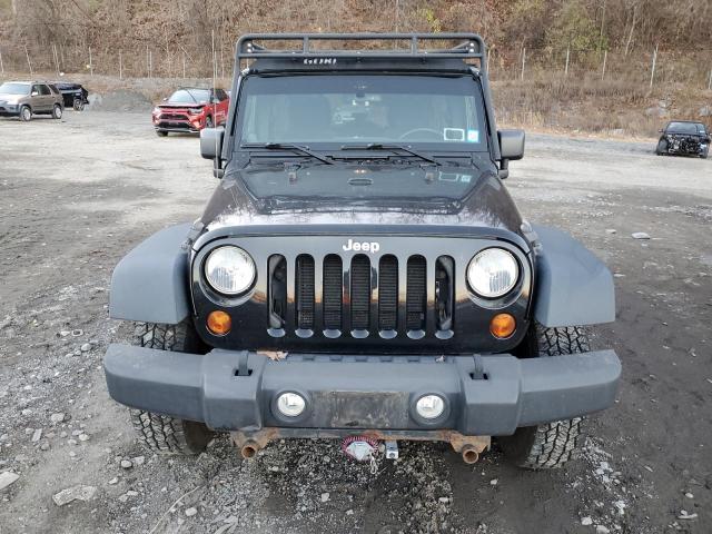 Photo 5 from auction – 2013 JEEP WRANGLER U with VIN 1C4BJWDG8DL654426