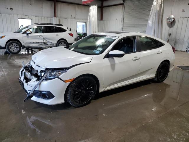 HONDA CIVIC EX 2018 with VIN JHMFC1F31JX033685 - Photo from auction