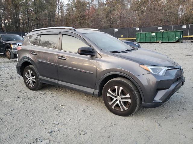 Photo 4 from auction – 2016 TOYOTA RAV4 LE with VIN JTMBFREVXGJ096451