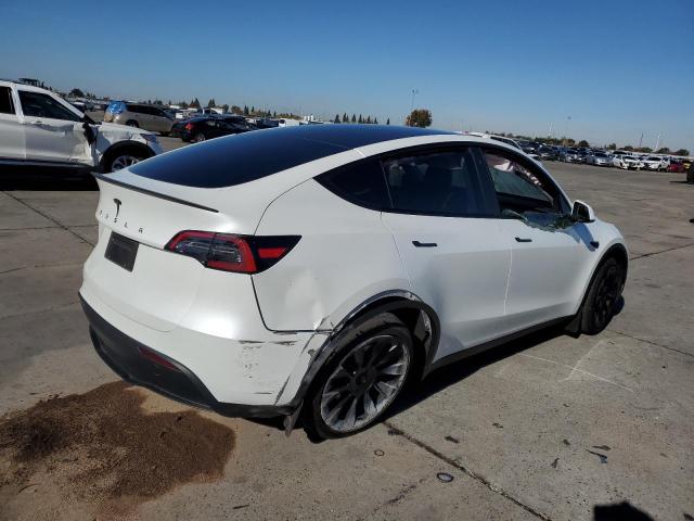 Photo 3 from auction – 2023 TESLA MODEL Y with VIN 7SAYGDEE6PF697828