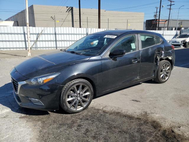 MAZDA 3 TOURING 2018 with VIN 3MZBN1L39JM166552 - Photo from auction