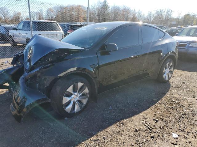 TESLA MODEL Y 2023 with VIN 7SAYGDEE2PA142744 - Photo from auction