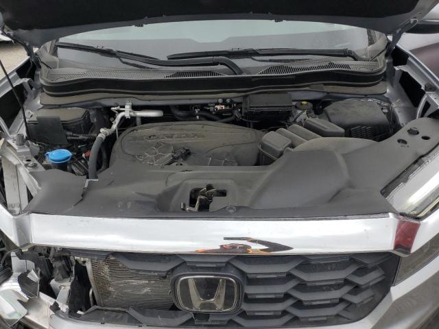 Photo 12 from auction – 2022 HONDA PASSPORT E with VIN 5FNYF8H54NB031552