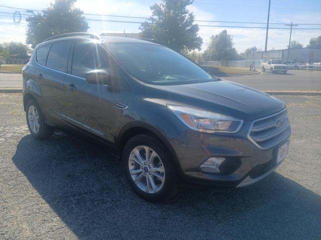 Photo 1 from auction – 2018 FORD ESCAPE SE with VIN 1FMCU0GD2JUD06066