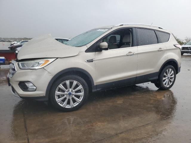 FORD ESCAPE TIT 2017 with VIN 1FMCU0J91HUD40160 - Photo from auction