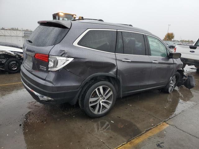 Photo 3 from auction – 2017 HONDA PILOT TOUR with VIN 5FNYF6H91HB040267