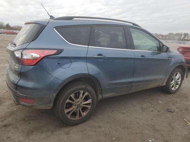 Photo 3 from auction – 2018 FORD ESCAPE SE with VIN 1FMCU9GD7JUC29537