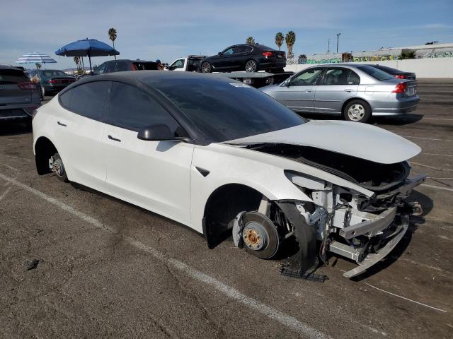 Photo 4 from auction – 2021 TESLA MODEL 3 with VIN 5YJ3E1EB3MF047934