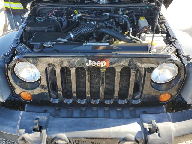 Photo 12 from auction – 2011 JEEP WRANGLER U with VIN 1J4BA3H15BL579132