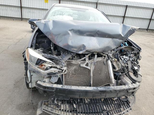 Photo 5 from auction – 2015 TOYOTA COROLLA L with VIN 5YFBURHE1FP184848