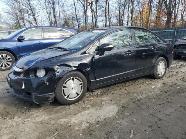HONDA CIVIC HYBR 2010 with VIN JHMFA3F24AS002503 - Photo from auction