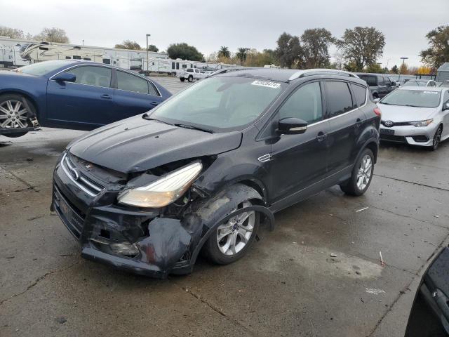 FORD ESCAPE TIT 2014 with VIN 1FMCU0J98EUD73992 - Photo from auction