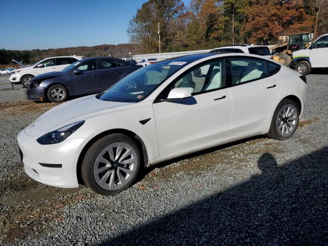 TESLA MODEL 3 2023 with VIN 5YJ3E1EAXPF673282 - Photo from auction