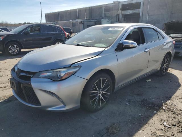 TOYOTA CAMRY LE 2015 with VIN 4T1BF1FK0FU049458 - Photo from auction