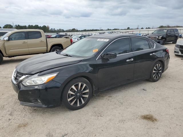 NISSAN ALTIMA 2.5 2018 with VIN 1N4AL3AP5JC270579 - Photo from auction