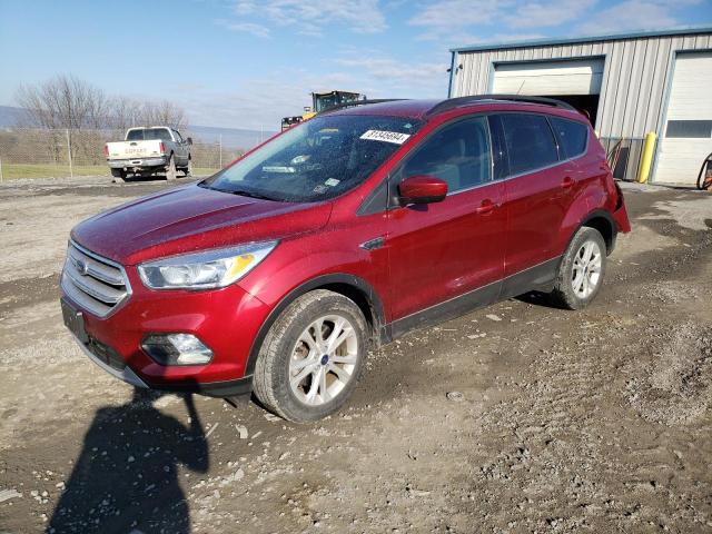 FORD ESCAPE SE 2018 with VIN 1FMCU9GD4JUB98313 - Photo from auction