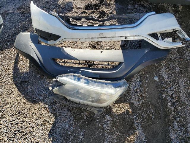 Photo 13 from auction – 2016 HONDA CR-V LX with VIN 5J6RM4H32GL131385