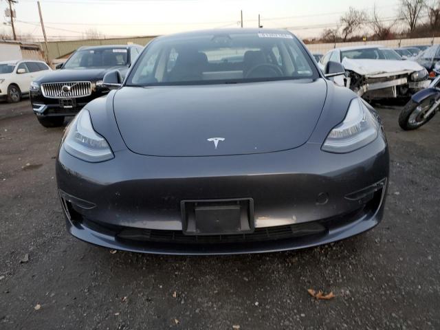 Photo 5 from auction – 2018 TESLA MODEL 3 with VIN 5YJ3E1EA3JF033261