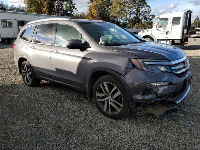 Photo 4 from auction – 2018 HONDA PILOT ELIT with VIN 5FNYF6H06JB049585
